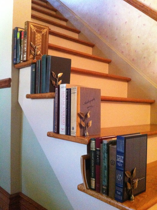 Who needs a bannister when you can make bookshelves? Seriously.